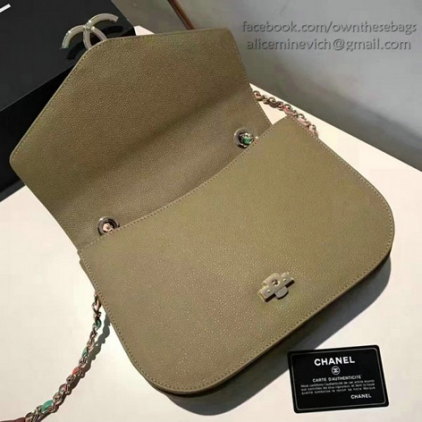 Ch**el grained calfskin flap bag with top handle green