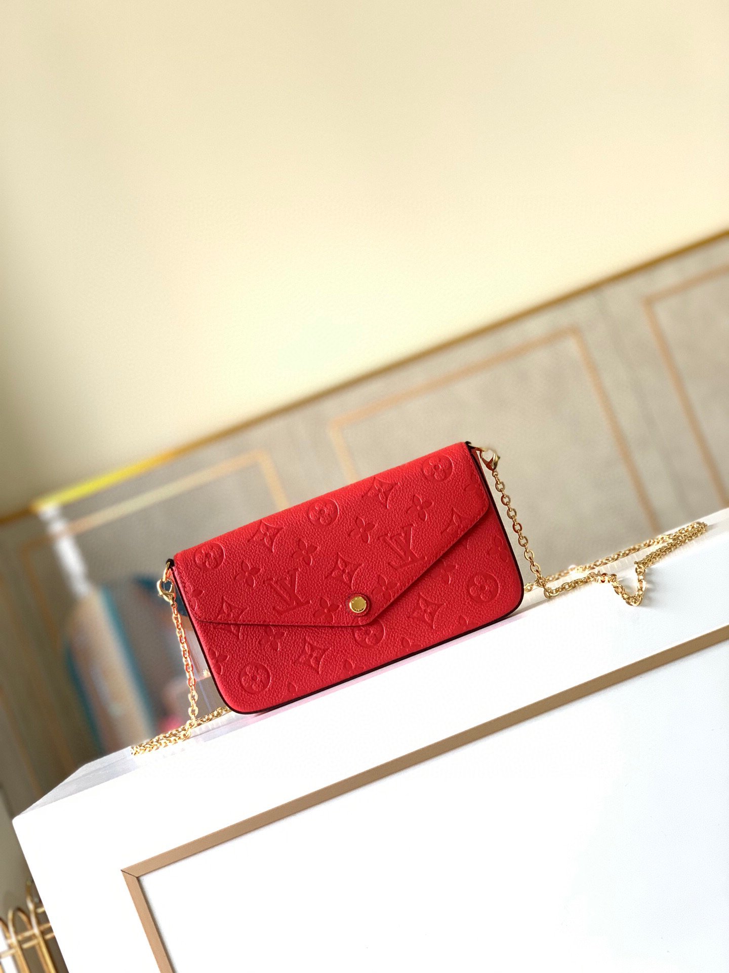 l0vis Vvtt0n fÉlicie pochette monogram empreinte leather red m63700 21 x 12 x 3 cm