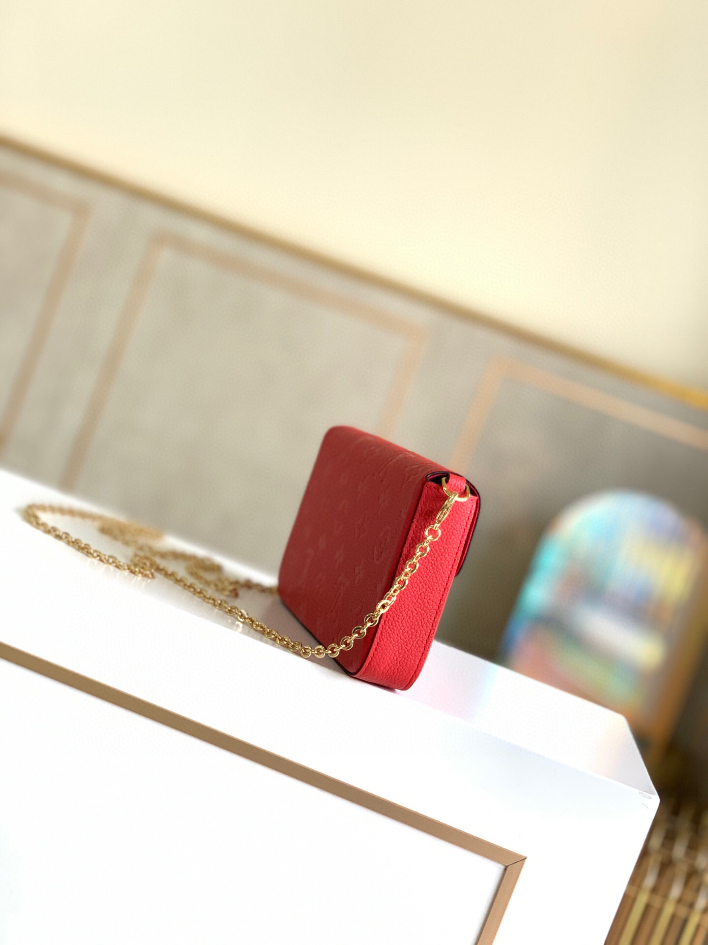 l0vis Vvtt0n fÉlicie pochette monogram empreinte leather red m63700 21 x 12 x 3 cm