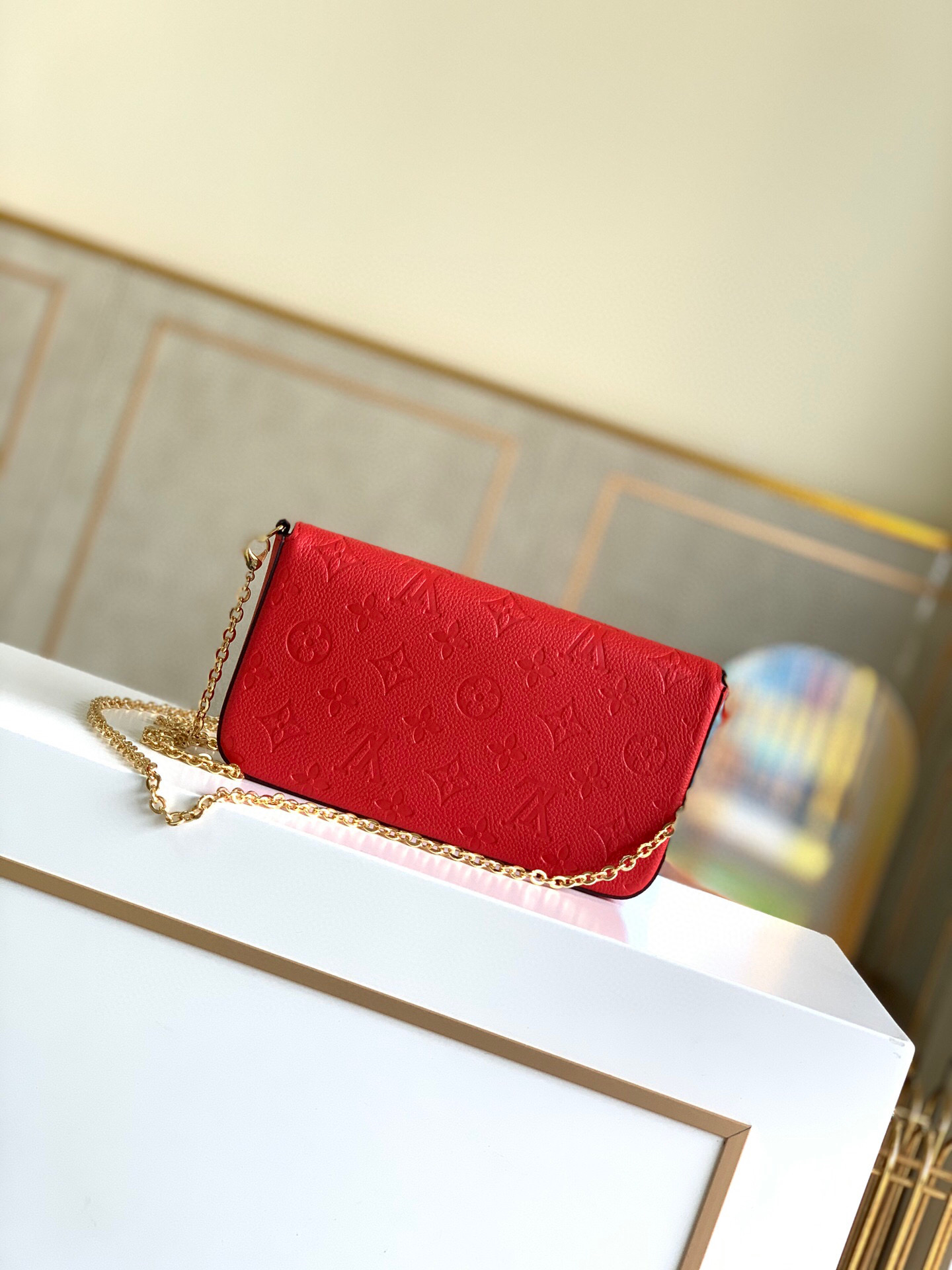 l0vis Vvtt0n fÉlicie pochette monogram empreinte leather red m63700 21 x 12 x 3 cm