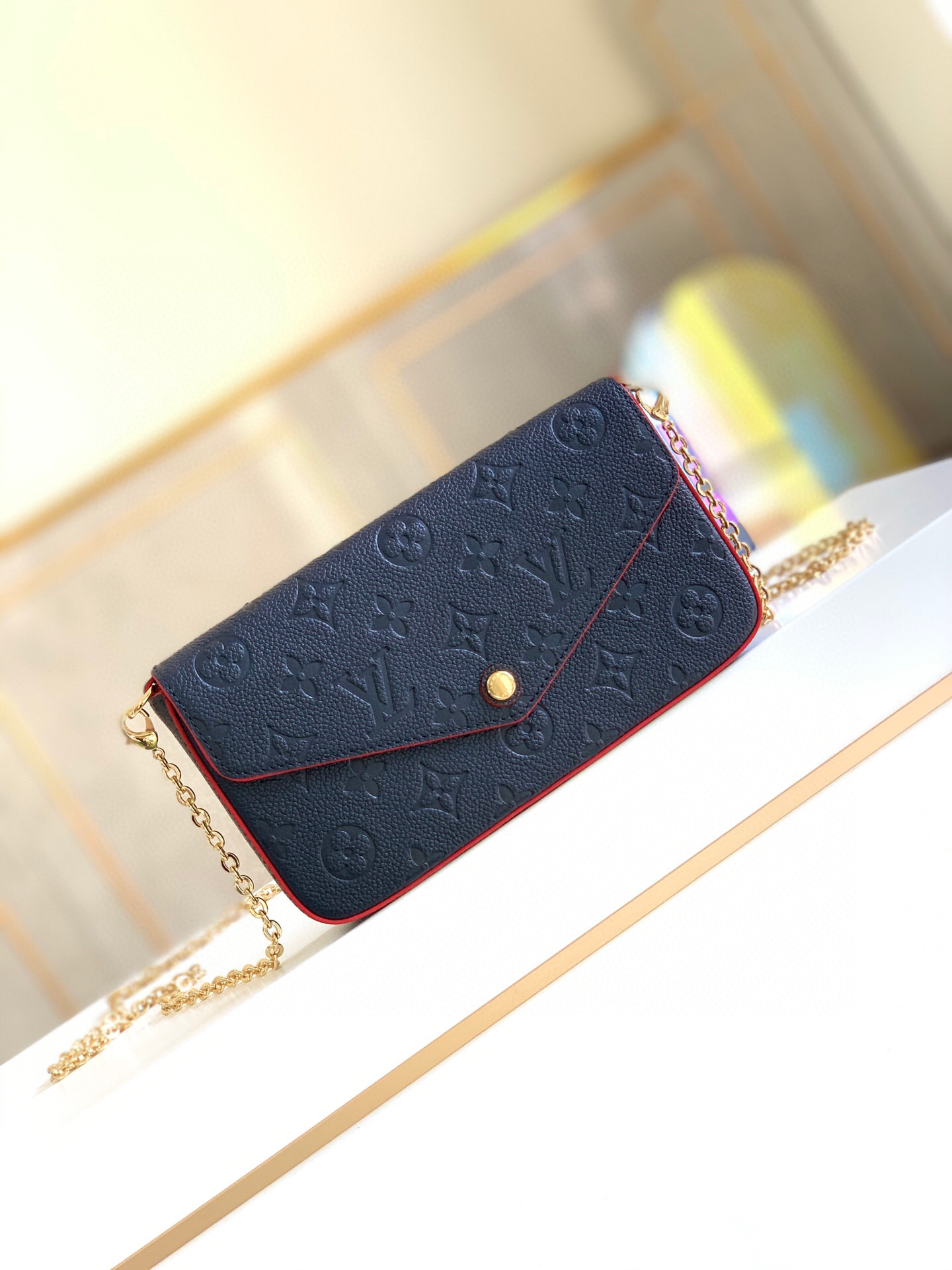 l0vis Vvtt0n fÉlicie pochette monogram empreinte leather navy and red m64099 21 x 12 x 3 cm