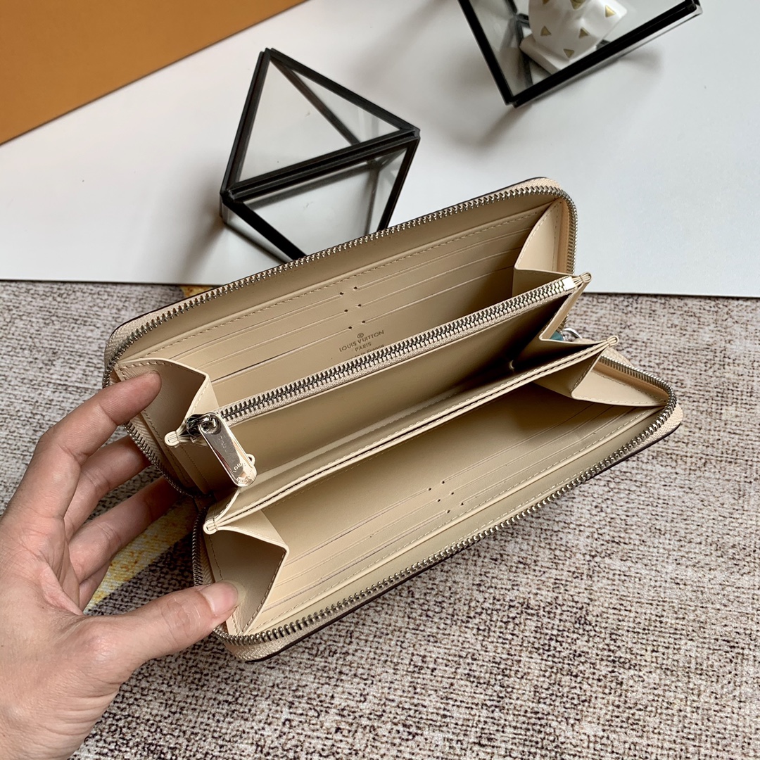 l0vis Vvtt0n zippy wallet monogram perforations mahina leather creme m61868 19 x 10 cm