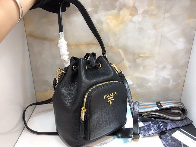 Pra*a bucket bag with metal logo and shoulder strap black 1be030 21 × 25 × 15 cm