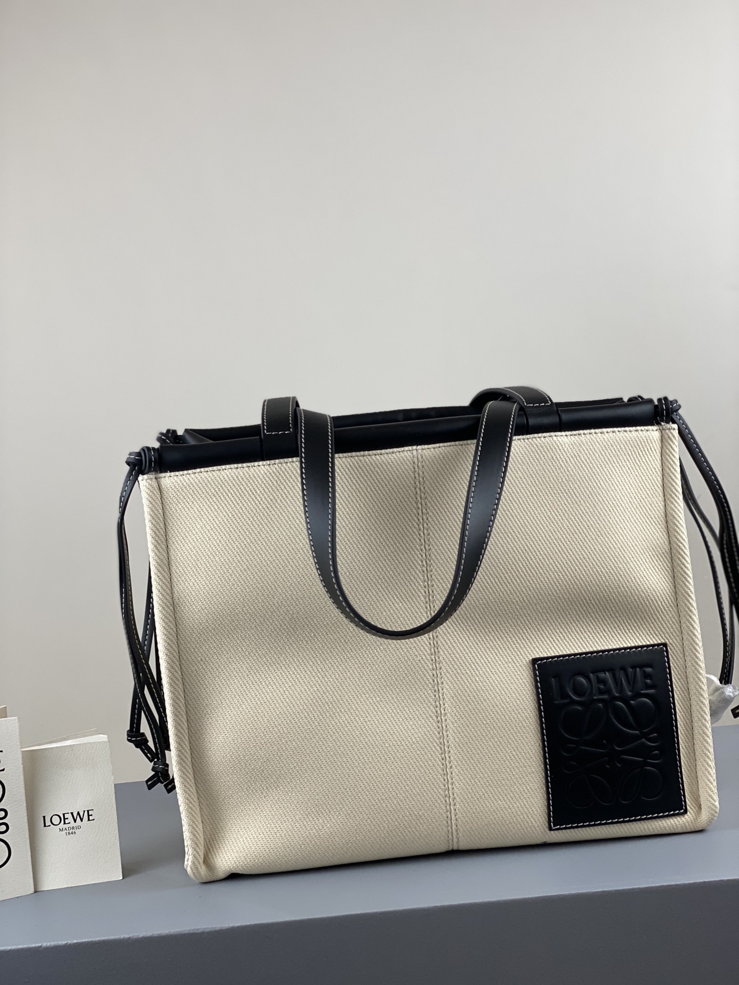 L0ew* small cushion tote bag canvas and calfskin light oat and black 330.02aa93 32 x 24 x 16cm