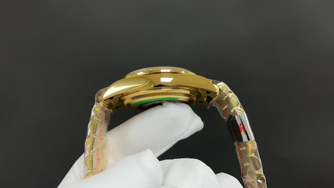 R01ex oyster perpetual day and date golden and blue 36 mm 2836