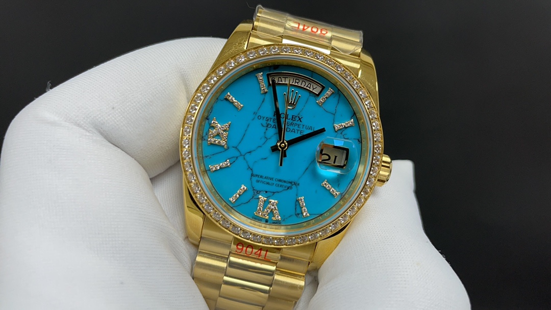 R01ex oyster perpetual day and date golden and blue 36 mm 2836