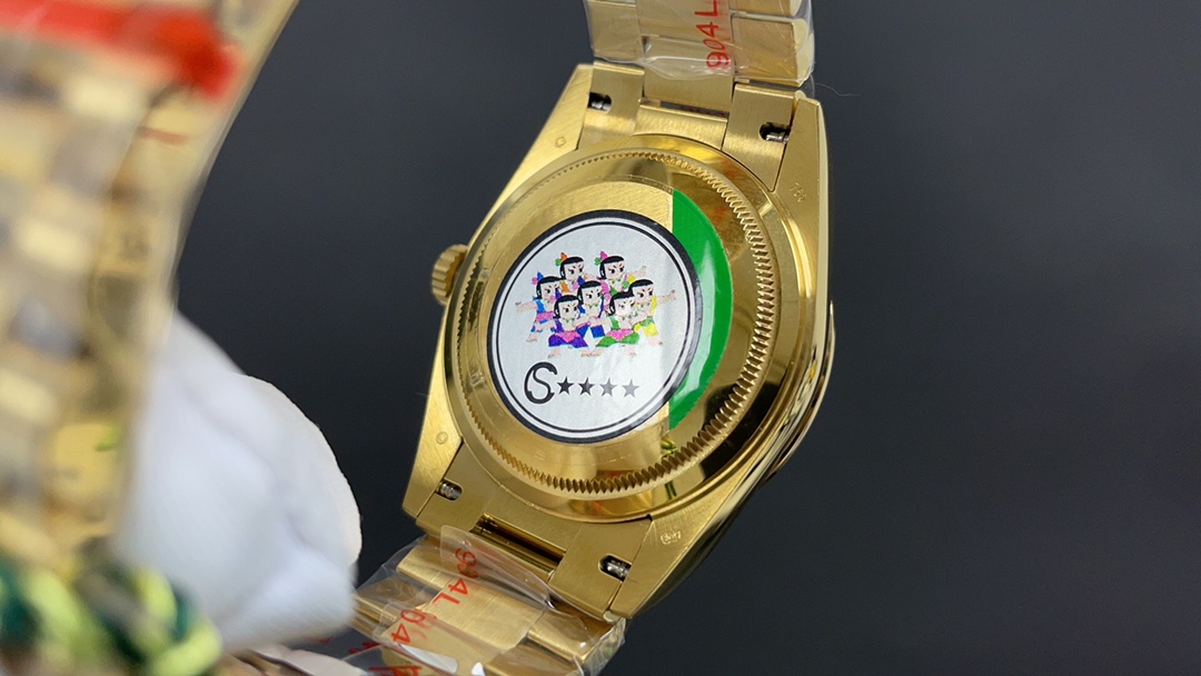 R01ex oyster perpetual day and date golden and blue 36 mm 2836